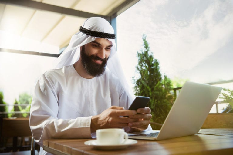 arabian saudi businessman working outdoors ADJS8ZX scaled