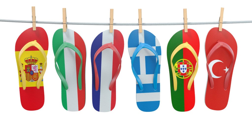 hanging flip flops in colors of different PNE5QWF