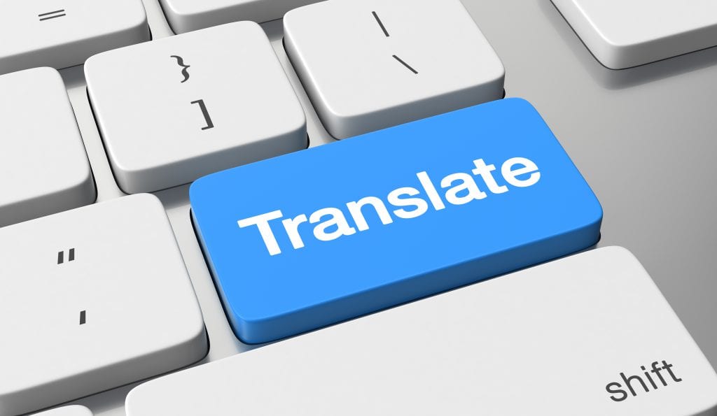 שירותי תרגום: בתמונה מקשי מחשב אחד בצבע כחול ועליו מודפס המילה תרגום